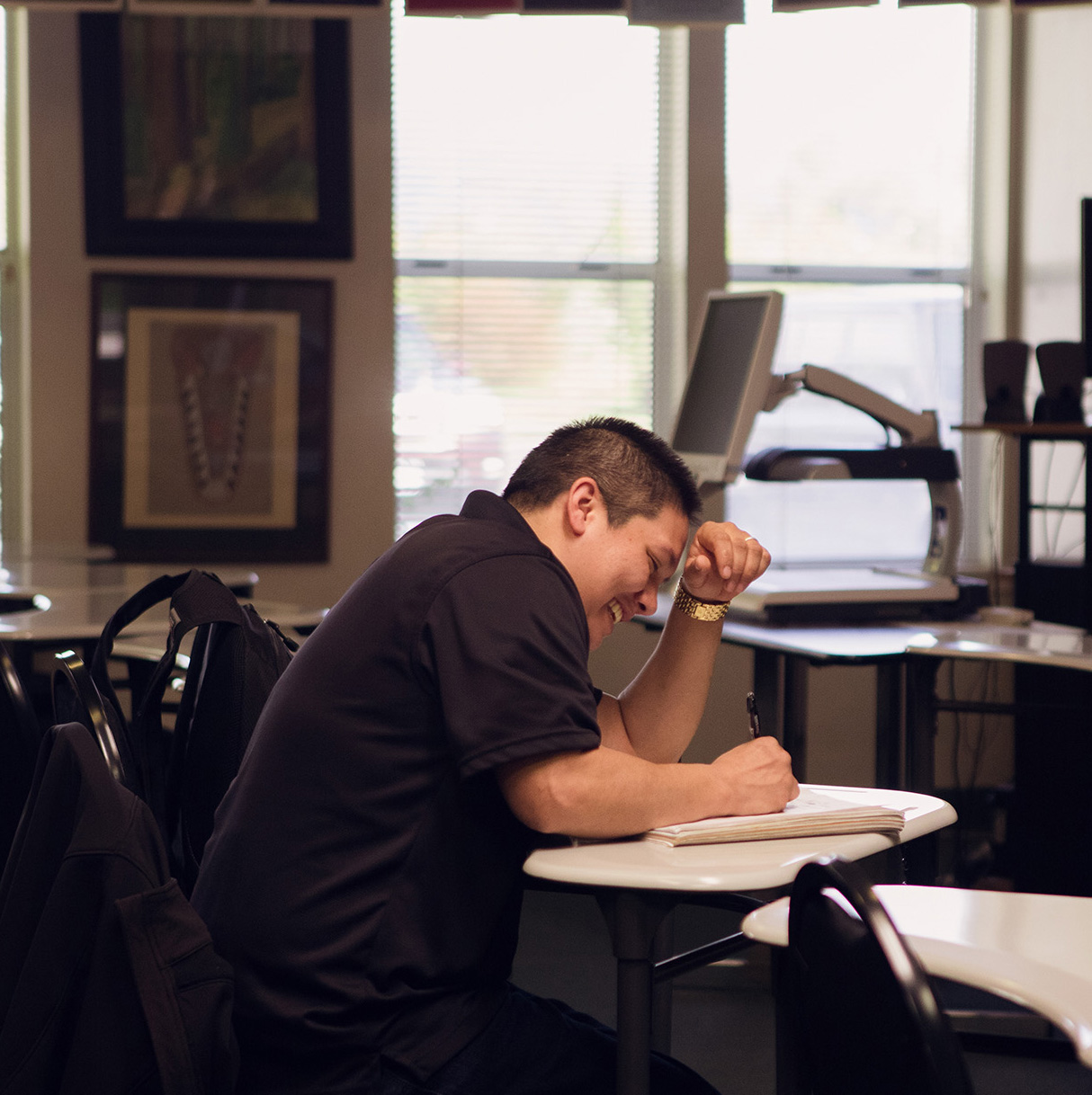 A student learning in a classroom